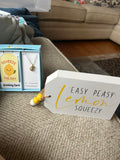 Lemon necklace and sign